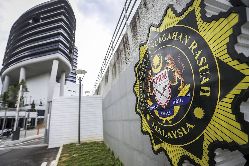 According to an MACC source, they were arrested on suspicion of bribery in order to obtain approval for an application to own approximately two hectares of government land in the Kinta district. — Picture by Hari Anggara