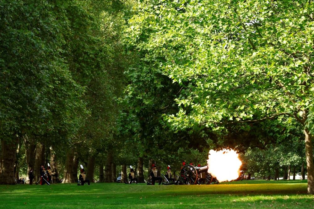 Gun salute is fired by King's Troop Royal Artillery at Hyde Park, where the screening of the procession of the coffin of Britain's Queen Elizabeth from Buckingham Palace to the Houses of Parliament takes place, in London September 14, 2022. — Reuters pic