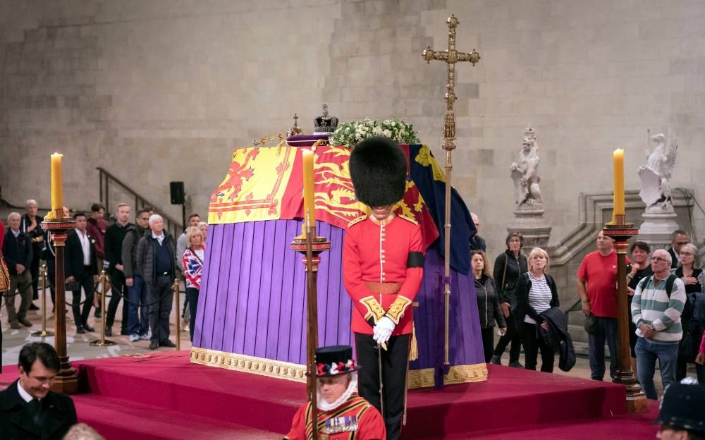 According to media reports, the Queen’s body is now in London, where she lies in state in Westminster Hall until the state funeral on Monday. — Pool pic via Reuters