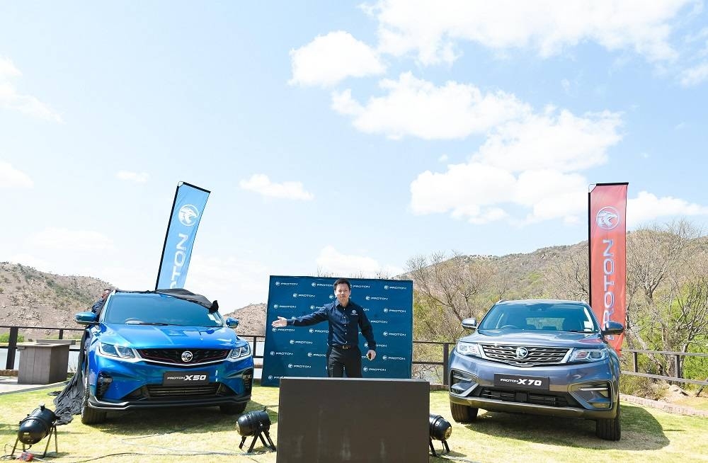 Micheal Chew, Senior Manager of Product Marketing, Proton sharing the unique features of both Proton models with the audience. — Picture courtesy of Proton