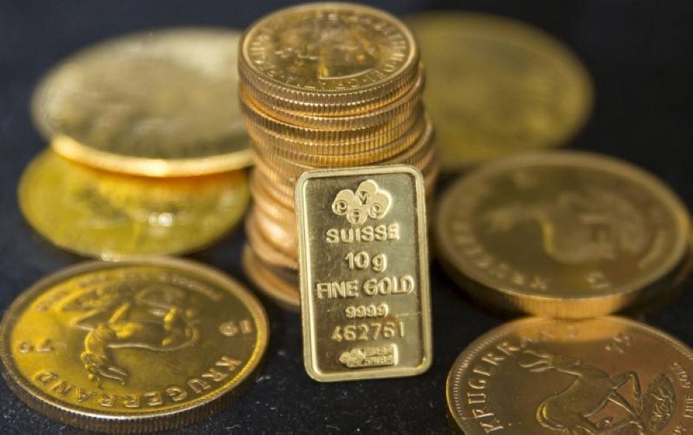 The price of gold is expected to recover and end the year higher at US$1,800 per ounce. — Reuters pic