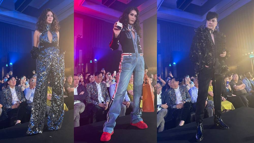 (From left) Miss Malaysia World 2015 Emmeline Ng, top model Amber Chia and celebrity hairstylist Albert Nico modelled on the runway of MMG fashion show on the evening of September 15. — Pictures by William KC Kee