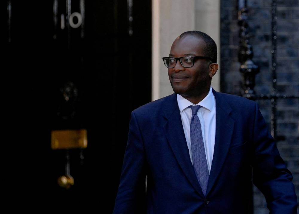 New British Chancellor of the Exchequer Kwasi Kwarteng walks outside Number 10 Downing Street, in London September 6, 2022. — Reuters pic