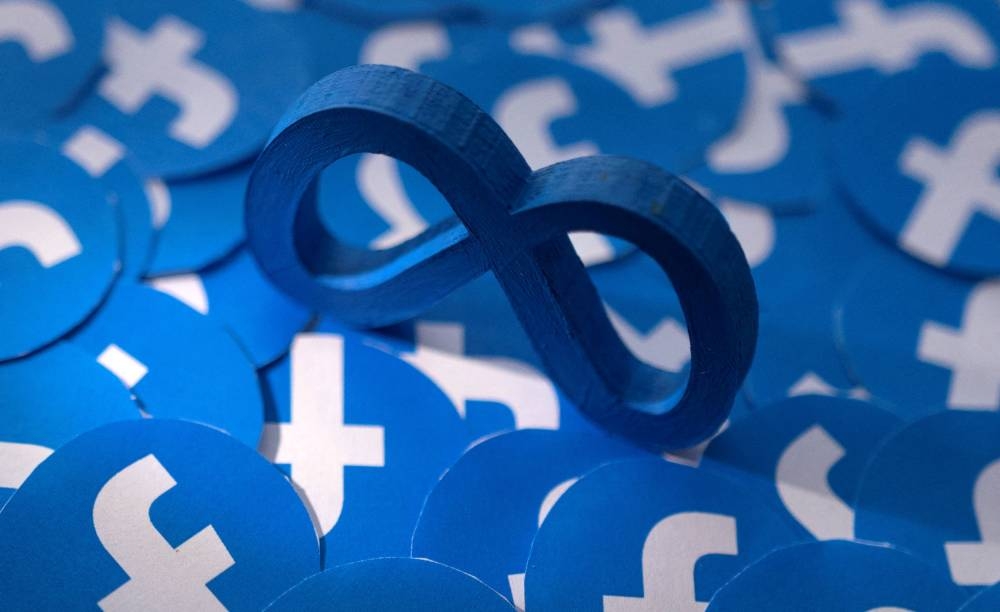 Meta and Facebook logos are seen in this illustration taken February 15, 2022. —  Reuters pic