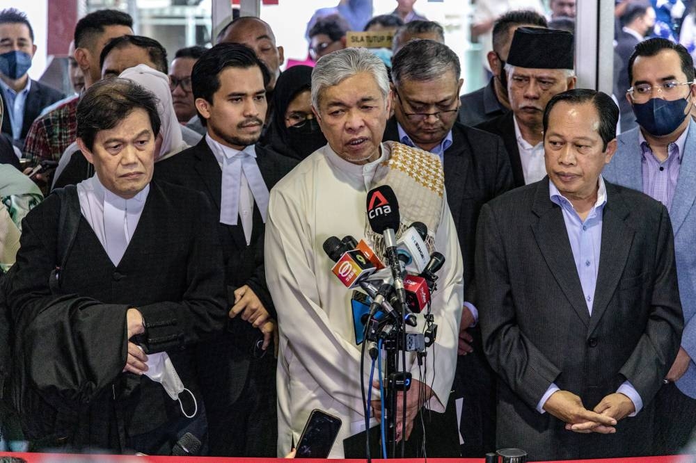 Datuk Seri Ahmad Zahid Hamidi speaks to reporters at the Shah Alam High Court Complex in Selangor September 23, 2022. ― Picture by Firdaus Latif