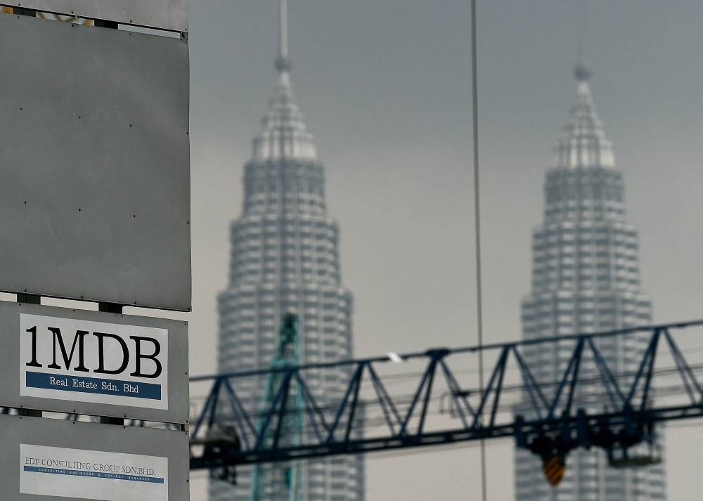 1MDB named Deutsche Bank (Malaysia) Bhd, Coutts & Co, JP Morgan (Switzerland), Petrosaudi International, Petrosaudi Holdings (Cayman), Tarik Obaid and Patrick Mahony as first to seventh defendants. — AFP pic