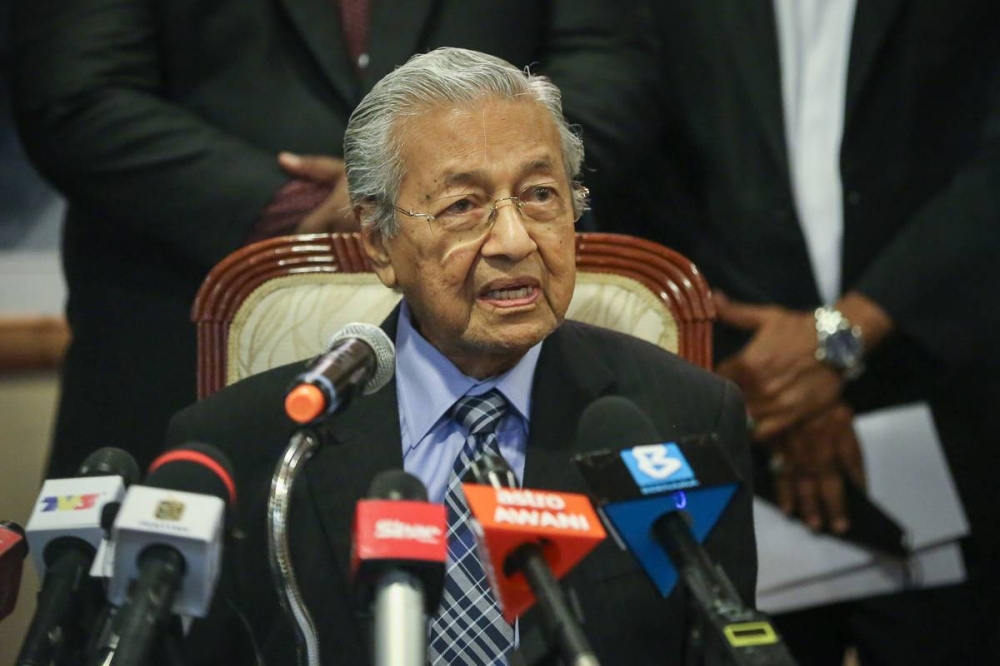 Tun Dr Mahathir Mohamad said he would reluctantly accept the responsibility of leading the government a third time if needed. — Picture by Yusof Mat Isa