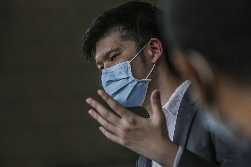 Lawyer Lim Wei Jiet speaks to reporters at the Kuala Lumpur High Court April 27, 2021. ― Picture by Hari Anggara