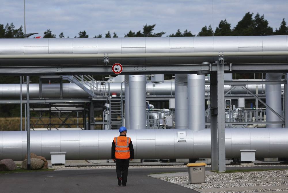 Security walks in front of the landfall facility of the Baltic Sea gas pipeline Nord Stream 2 in Lubmin, Germany, September 19, 2022. — Reuters pic