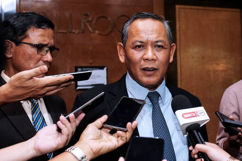 Negri Sembilan Mentri Besar Datuk Seri Aminuddin Harun speaks to the media while attending the state-level 2022 National Day appreciation ceremony in Klana Resort, Seremban September 26, 2022. — Bernama pic