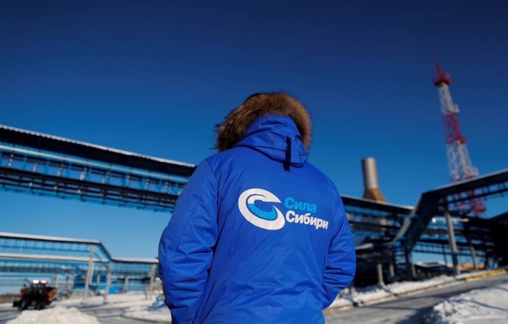 An employee in branded jacket is seen at the Atamanskaya compressor station, facility of Gazprom's Power Of Siberia gas pipeline outside the far eastern town of Svobodny, in Amur region, Russia November 29, 2019. — Reuters pic