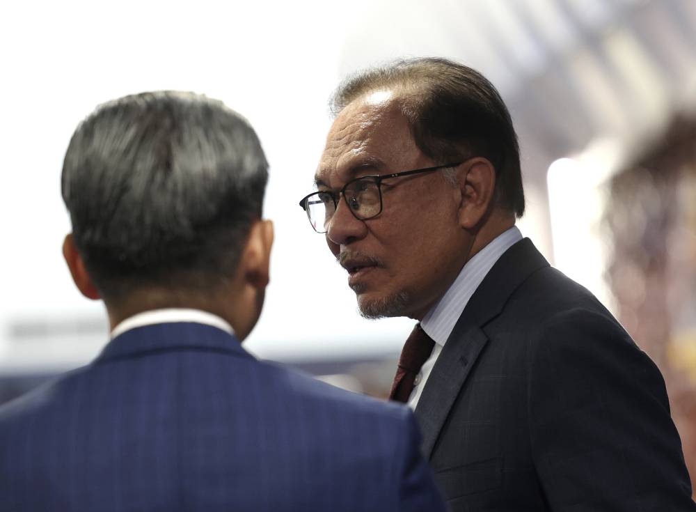 Datuk Seri Anwar Ibrahim said it was also decided that the three states will not hold state elections until the flood issues have been resolved, and that would most likely be in February or March. — Bernama pic 