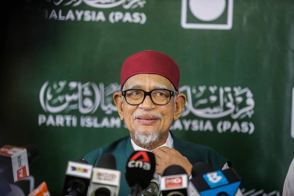 Tan Sri Abdul Hadi Awang said PAS will continue its efforts to unite the ummah, which requires ‘commitment’ from all three of the country’s core Malay Muslim parties to ensure the country is stable after the 15th general election. ― Picture by Sayuti Zainudin