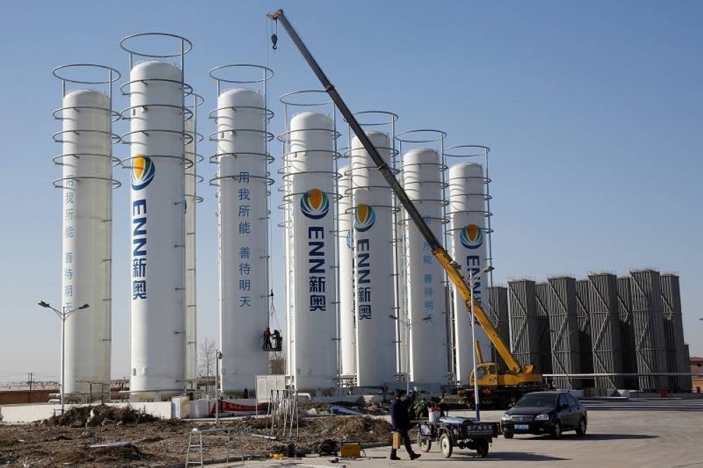 A liquefied natural gas (LNG) storage facility of the ENN Group Co is under construction in Baoding, Hebei province, China December 5, 2017. — Reuters pic