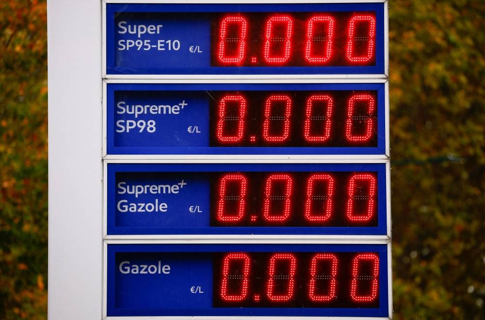 An empty price board with zeros indicates that no gas is available at a Esso gas station in Le Vesinet near Paris October 14, 2022. — Reuters pic