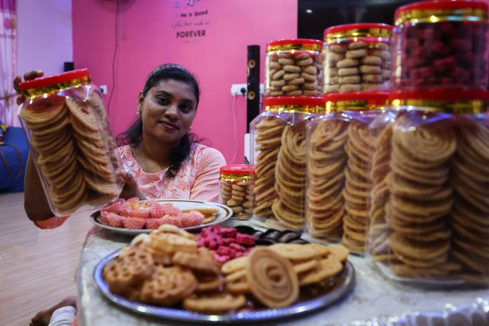 J. Mishalin shows some of the cakes ordered by her customers ahead of the Deepavali festival, when met by Bernama in Nibong Tebal, October 22, 2022. — Bernama pic