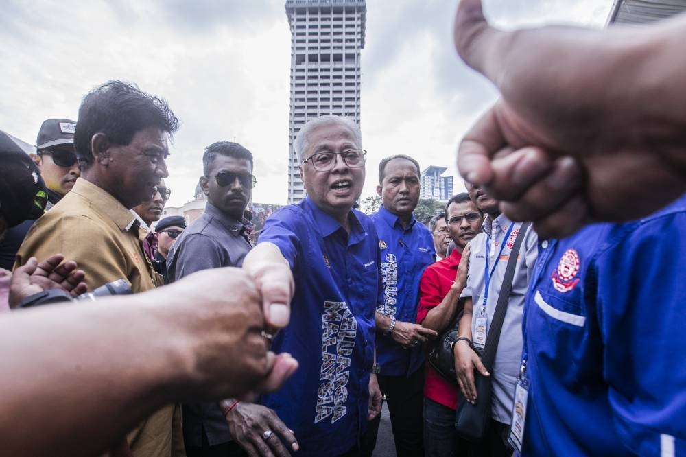 Datuk Seri Ismail Sabri Yaakob during the walkabout after attends the gathering of hawkers, petty traders and small business owners event at Dataran Merdeka October 20, 2022. — Picture by Hari Anggara