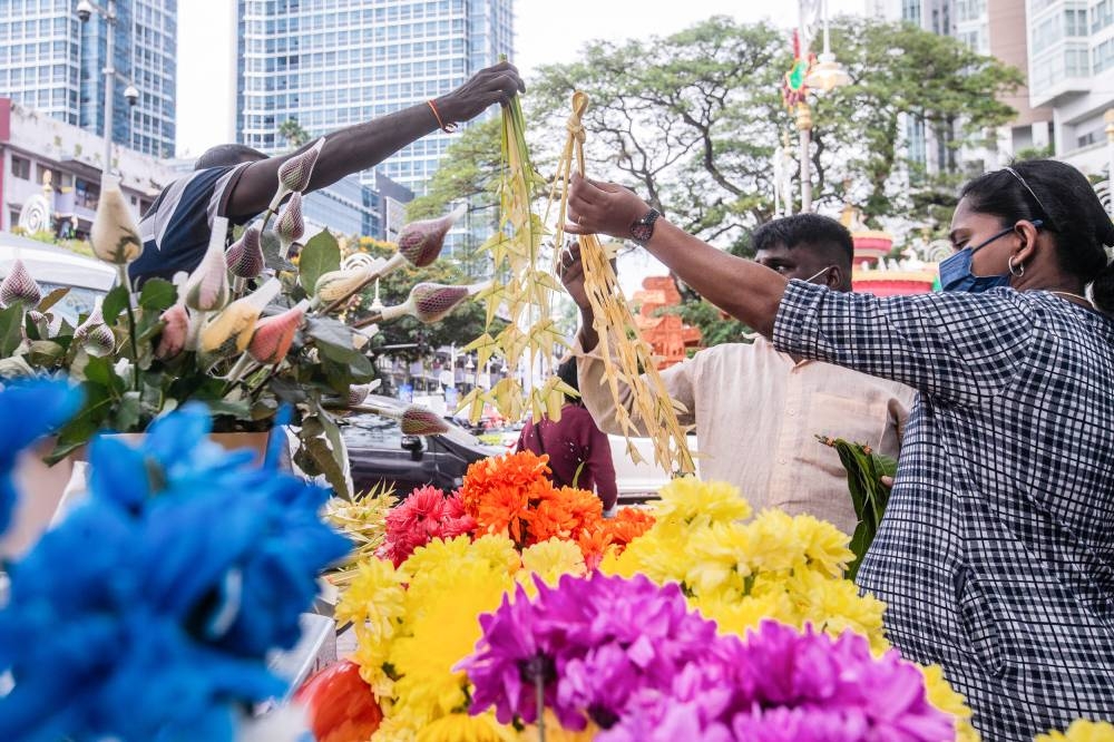 People shop in preparation for the Deepavali celebration tomorrow in Brickfields October 23, 2022. — Picture by Hari Anggara