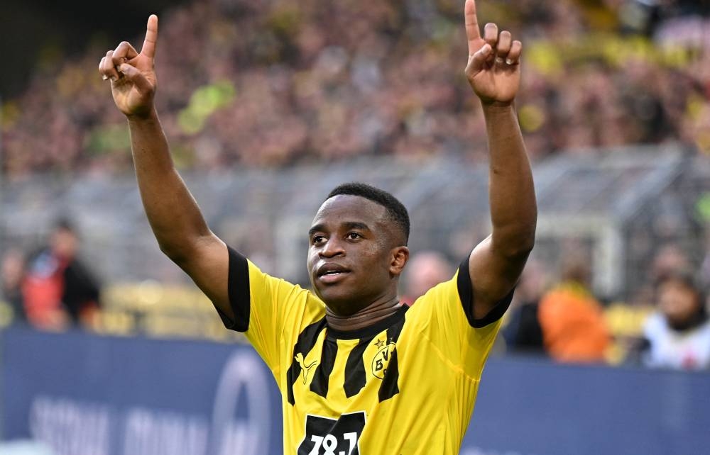 Borussia Dortmund's Youssoufa Moukoko celebrates scoring their fifth goal in the match against VfB Stuttgart.. — Reuters pic