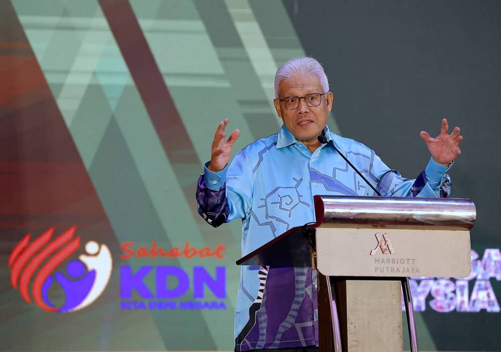 Datuk Seri Hamzah Zainudin delivers a speech during the People’s Volunteer Corps’ Golden Jubilee celebration in Putrajaya October 25, 2022. — Bernama pic