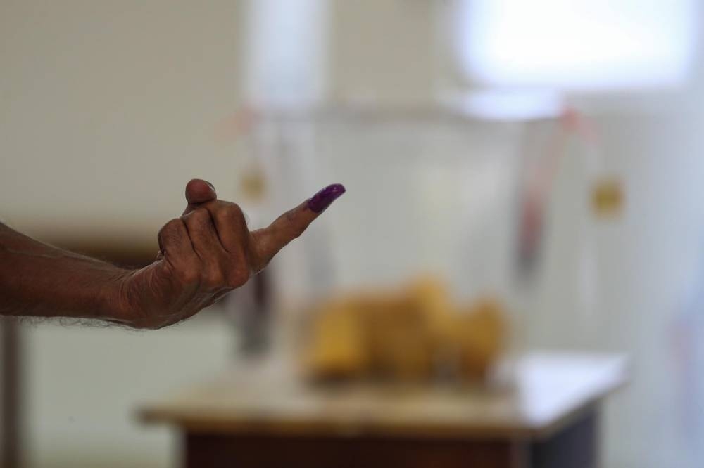 There could be up to seven million first time voters at the 15th general election, with over a tenth of them aged between 18 to 20. — Picture by Hari Anggara