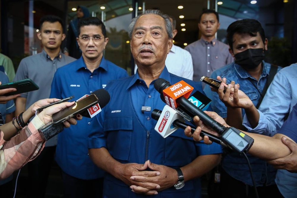 Perikatan Nasional chairman Tan Sri Muhyiddin Yassin speaks to reporters outside the Yayasan Selangor building in Petaling Jaya, October 27, 2022. — Picture by Yusof Mat Isa