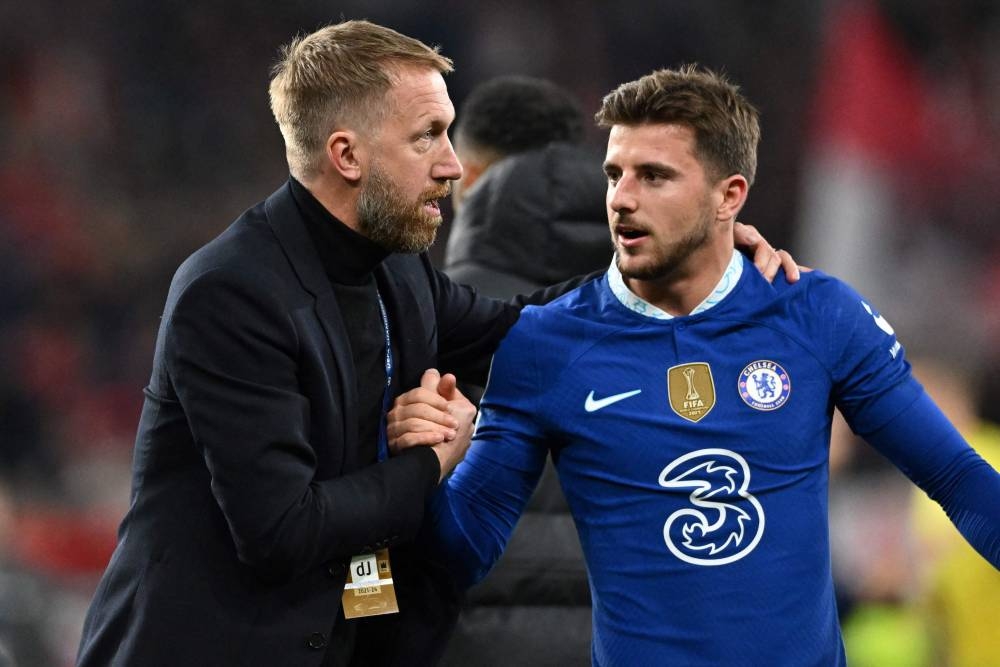 Chelsea head coach Graham Potter reacts with midfielder Mason Mount at the end of the Uefa Champions League Group E match between RB Salzburg and Chelsea FC in Salzburg, Austria, October 25, 2022. — AFP pic 