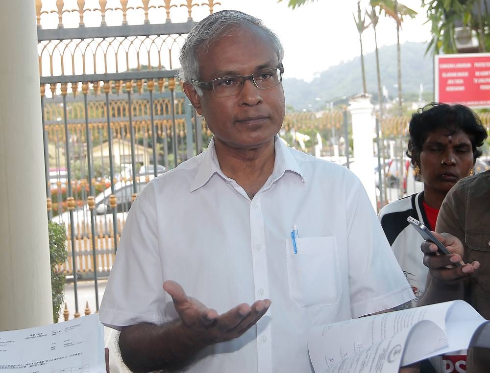 A 2019 file photograph shows PSM chairman Dr Michael Jeyakumar Devaraj speaking to the press outside the State Secretariat Building in Ipoh. — Picture by Farhan Najib