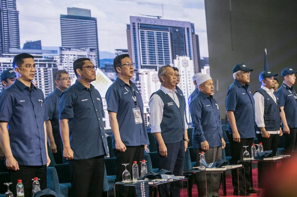 Perikatan Nasional chairman Tan Sri Muhyiddin Yassin with Perikatan supreme council members at GE15’s candidate announcement at Malaysia International Trade and Exhibition Centre (Mitec), October 31, 2022. — Picture by Hari Anggara