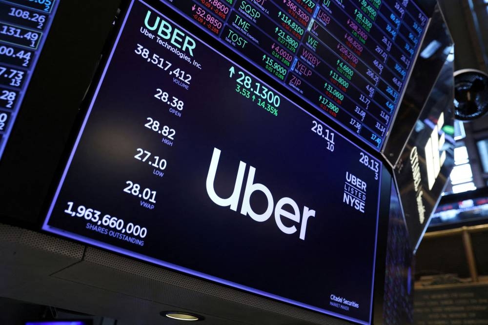 The Uber logo is seen on the trading floor at the New York Stock Exchange (NYSE) in Manhattan, New York City August 2, 2022. — Reuters pic