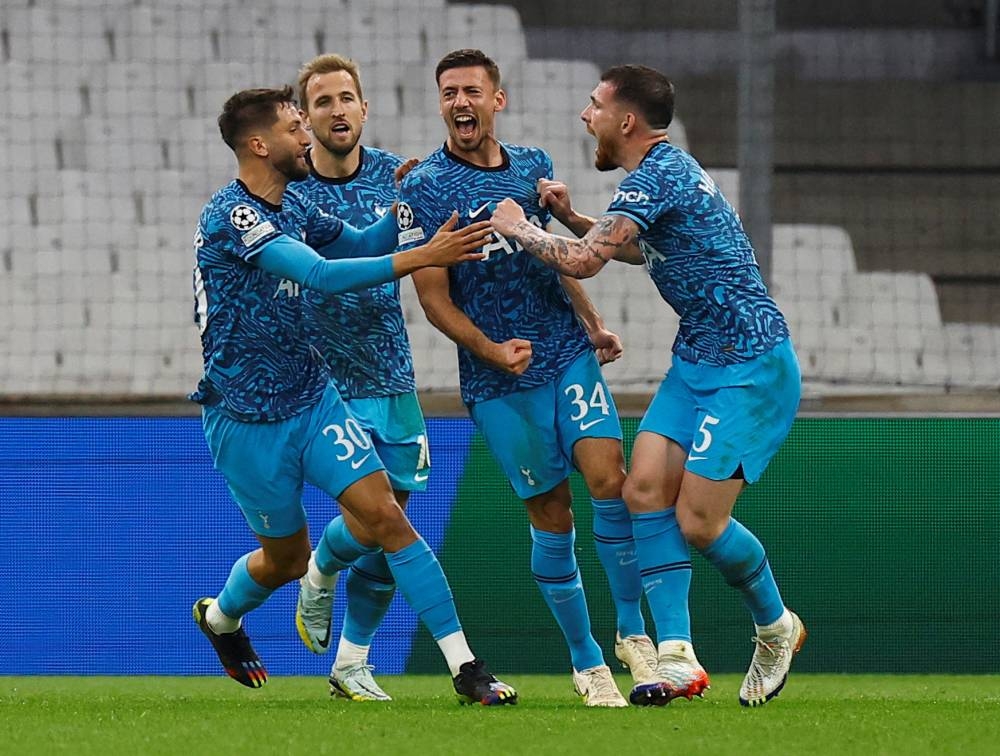 Tottenham Hotspur's Clement Lenglet (second from right) celebrates scoring their first goal against Olympique de Marseille with Rodrigo Bentancur, Harry Kane and Pierre-Emile Hojbjerg at the Orange Velodrome, Marseille November 1, 2022. — Reuters pic