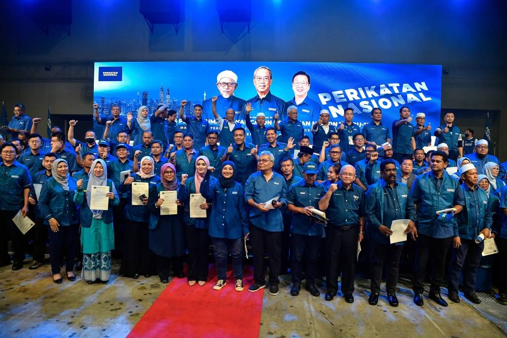 Perikatan Nasional's candidates for GE15 pose for the cameras following their unveiling at the Malaysia International Trade and Exhibition Centre November 1, 2022. — Bernama pic