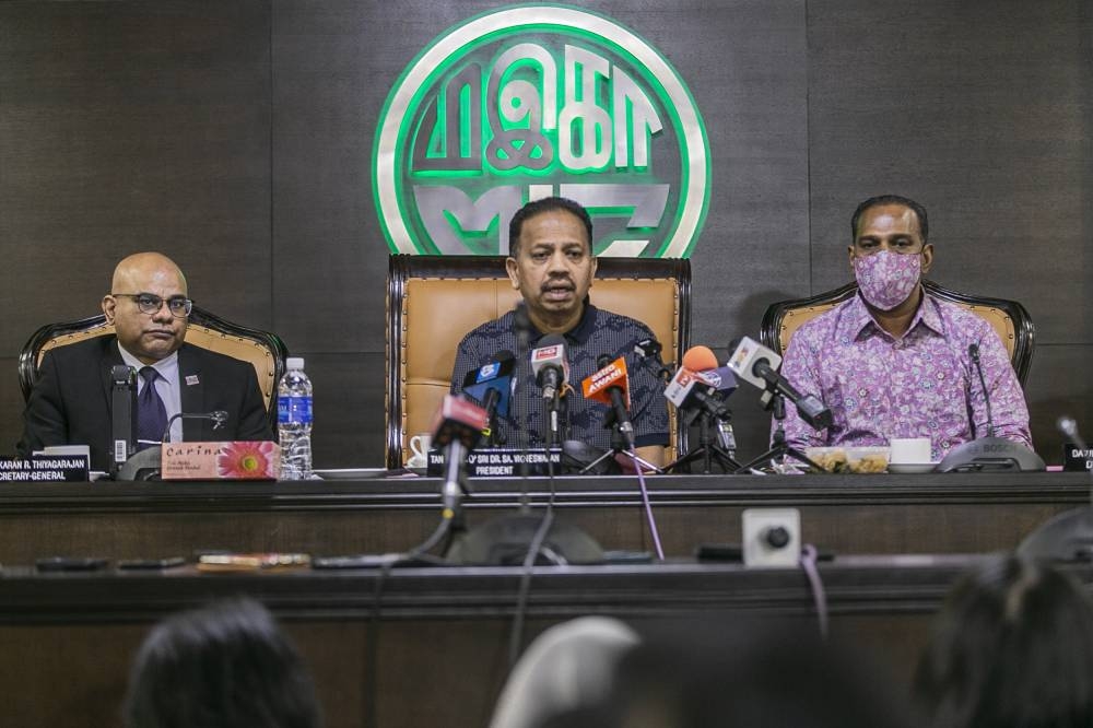 MIC president Tan Sri SA Vigneswaran (centre) addresses members of the media during a press conference at the party's headquarters in Kuala Lumpur November 2, 2022. — Picture by Hari Anggara