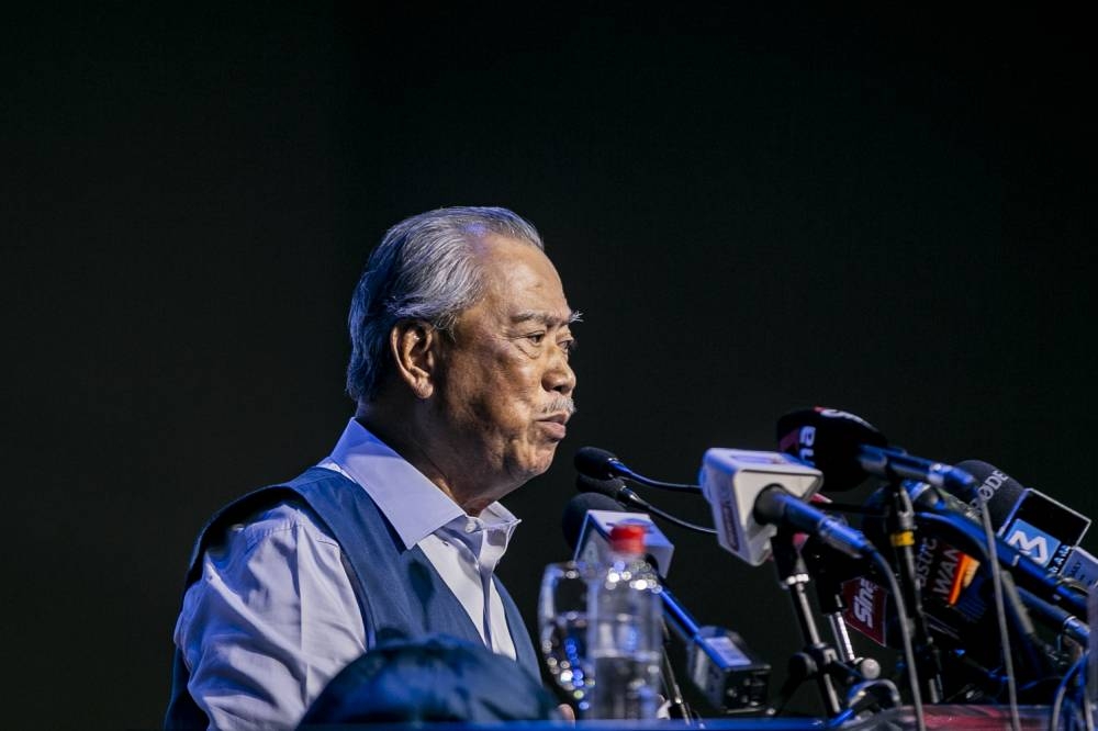 Bersatu president Tan Sri Muhyiddin Yassin delivers a speech during the unveiling of Perikatan candidates for GE15 at the Malaysia International Trade and Exhibition Centre October 31, 2022. — Picture by Hari Anggara