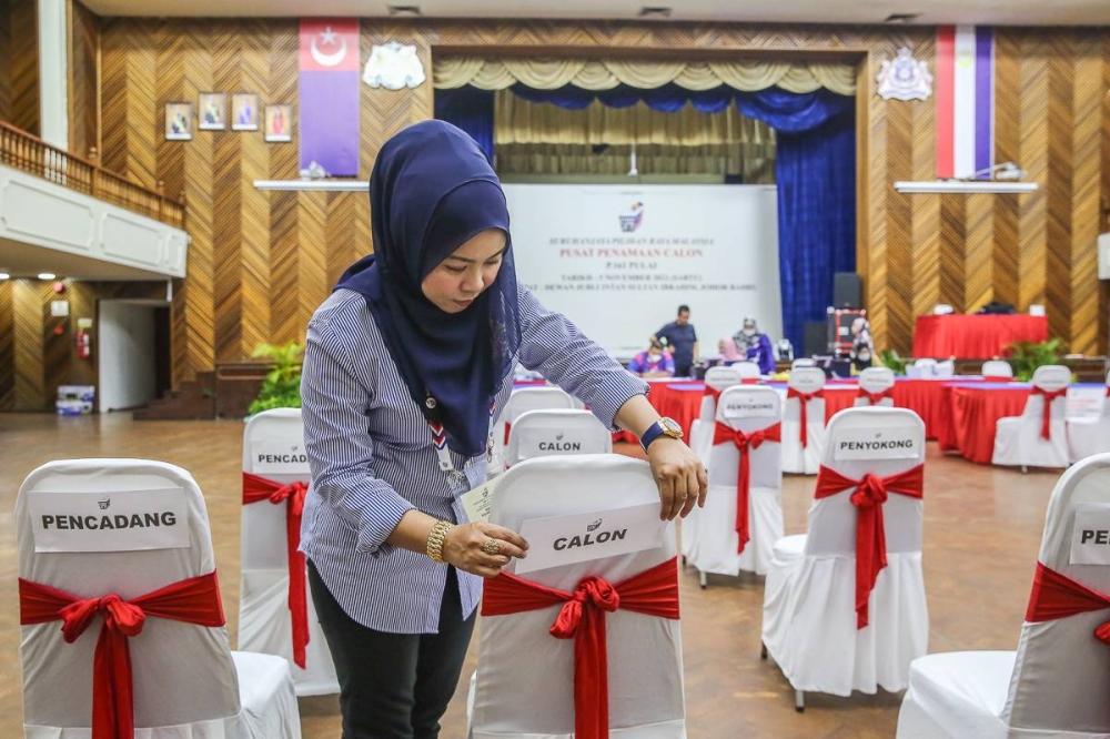 An Election Commission personnel makes final preparations at a nomination centre in Johor Baru November 4, 2022. — Picture by Yusof Mat Isa