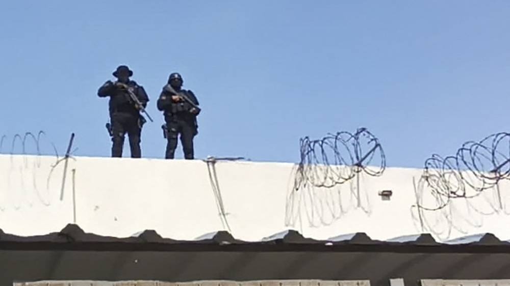 Handout picture released by SNAI showing security forces during an operative at Guayas 1 prison after an attempted riot in Guayaquil, Ecuador, on November 3, 2022. — AFP pic