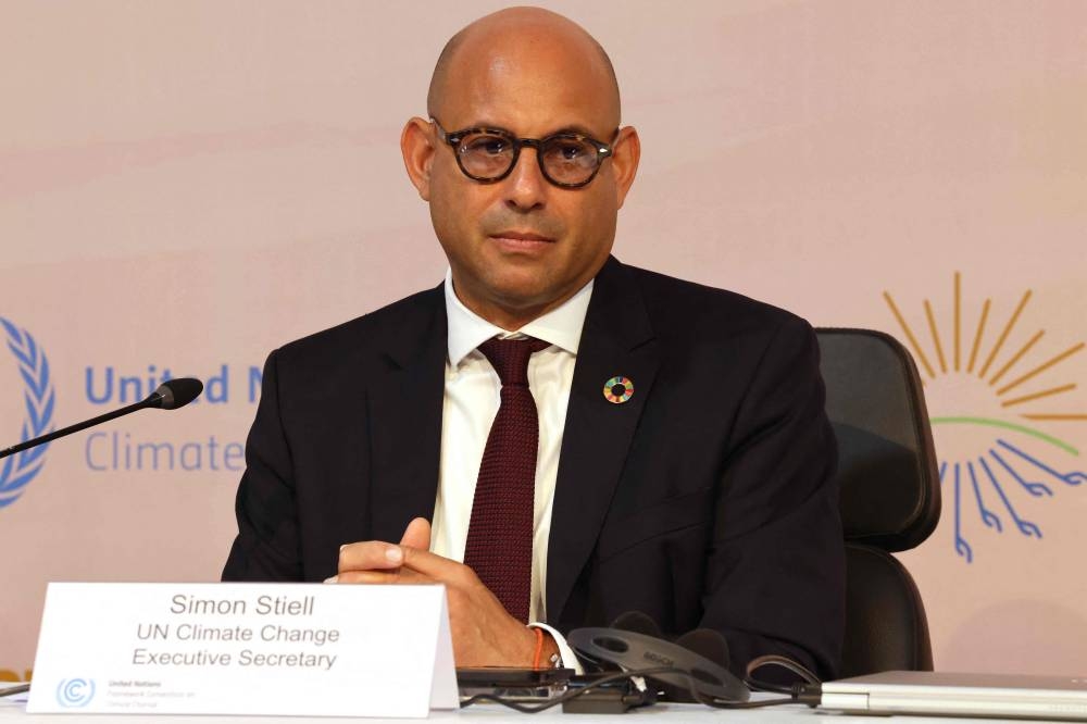 UN's climate change executive secretary Simon Stiell speaks during a press conference following the opening ceremony of the 2022 United Nations Climate Change Conference, more commonly known as COP27, at the Sharm El Sheikh International Convention Centre, in Egypt's Red Sea resort of the same name. — AFP pic