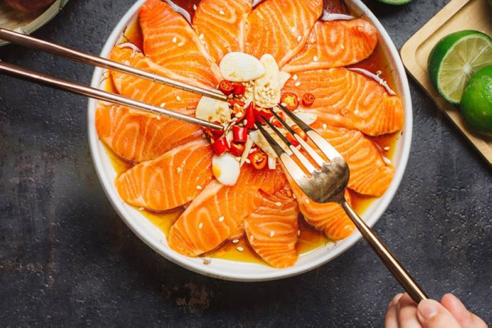 A platter of marinated salmon sashimi is perfect for sharing.