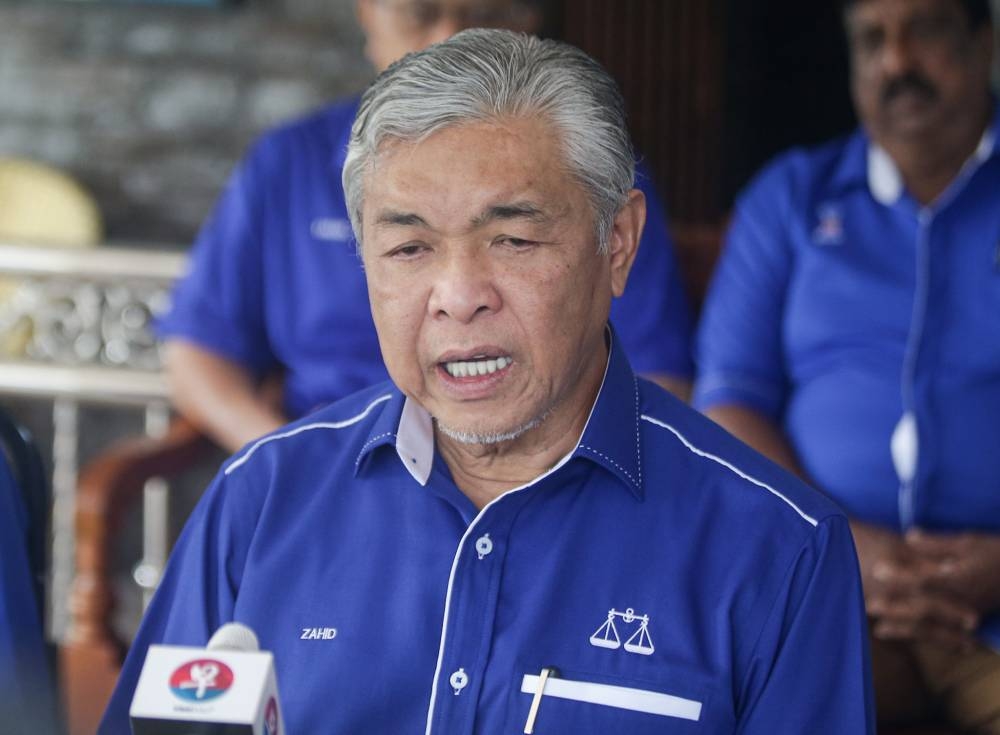 Datuk Seri Ahmad Zahid Hamidi, who is also Umno president, said if BN wins in the upcoming GE15 and forms the new government, the three DPM posts will definitely be created, each to represent the peninsula, Sabah and Sarawak, along with ministerial portfolios to be decided later. — Picture By Farhan Najib