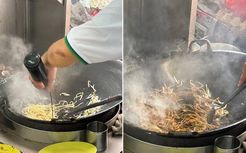 Cher Poh Kiat adds soy sauce and fish sauce to the noodles (left). The noodles are fried until there's smoke coming out from the wok (right).