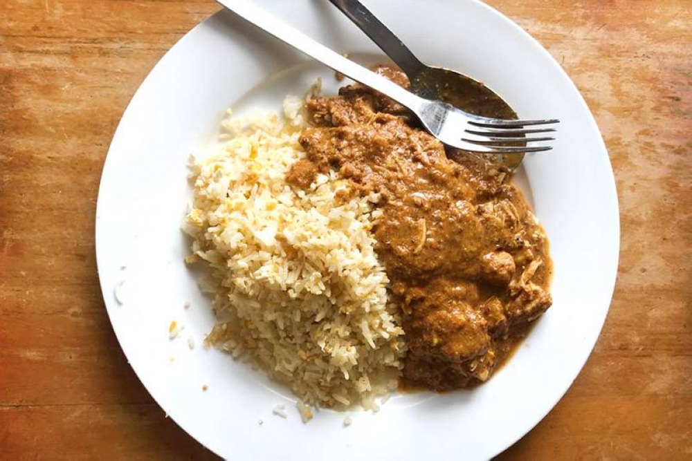 Leftover lifesavers: Creamy chicken curry and golden egg rice. — Pictures by CK Lim