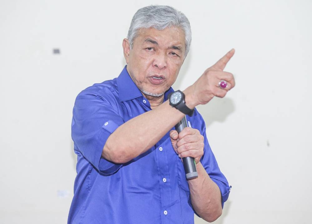 The Umno president alleged that the Malay nationalist party’s existence was in grave danger from its political enemies if Barisan Nasional (BN) does not win tomorrow. —Picture by Farhan Najib