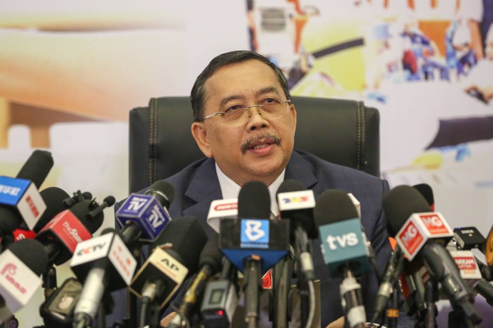 Election Commission chairman Tan Sri Ghani Salleh said the meeting held today also decided that nomination would be conducted on November 24 while early voting would take place on December3. — Picture by Yusof Mat Isa