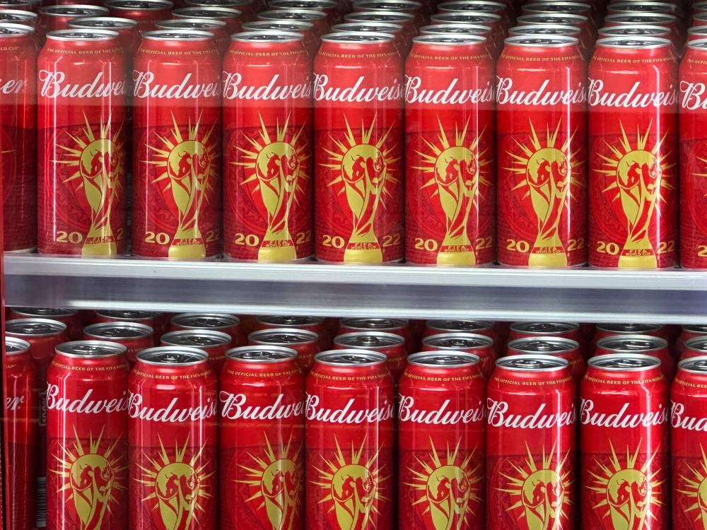 Cans of Budweiser beer featuring the Fifa World Cup logo are displayed in Doha on November 18, 2022 ahead of the Qatar 2022 World Cup football tournament. — AFP pic 