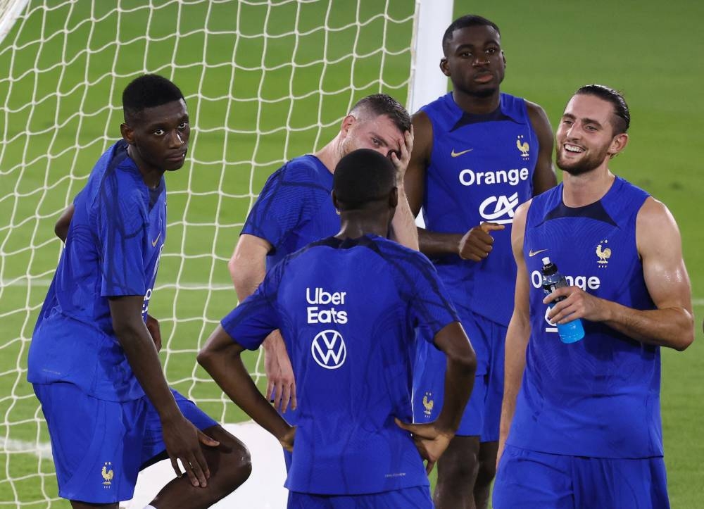 France’s Randal Kolo Muani and Adrien Rabiot with teammates during training at Al Sadd SC Stadium, Doha, Qatar, November 17, 2022. — Reuters pic 