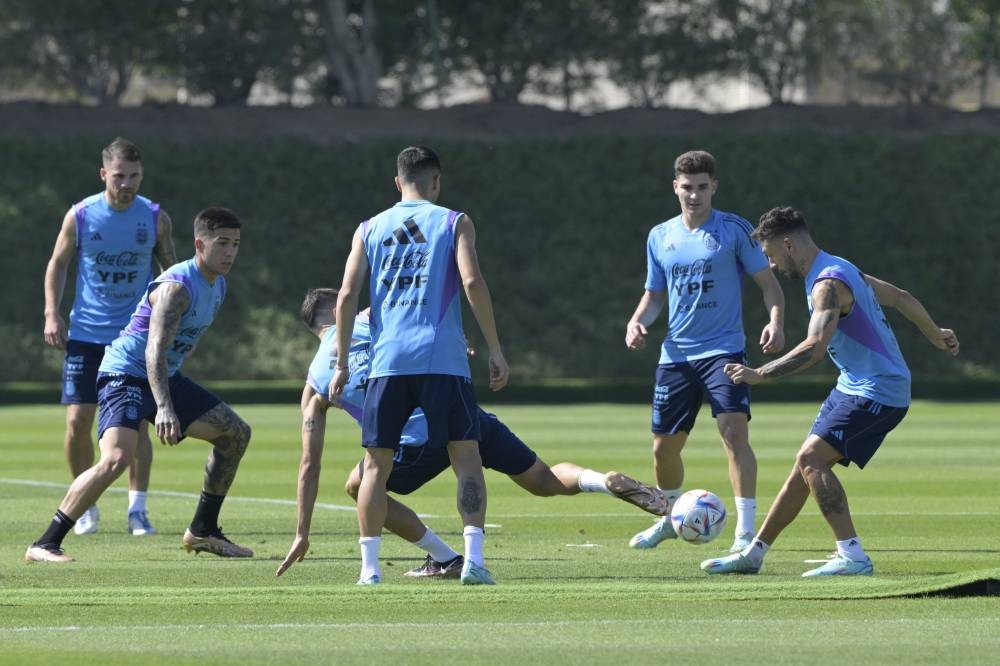 Argentina's footballers attend a training session at Qatar University in Doha November 23, 2022. — AFP pic