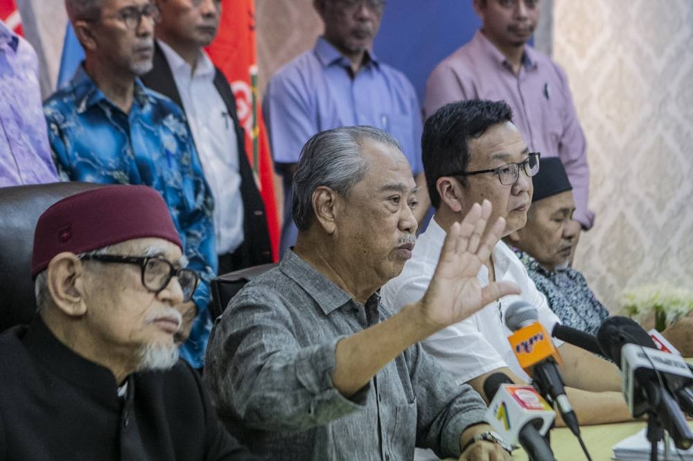 PN chairman Tan Sri Muhyiddin Yassin at a press conference wit other members at PN headquarters in Publika, November 24, 2022. — Picture by Hari Anggara