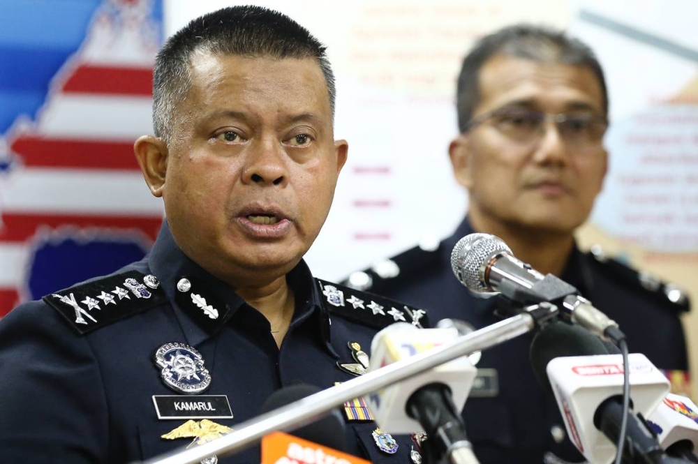 Johor police chief Datuk Kamarul Zaman Mamat police chief Datuk Kamarul Zaman Mamat said the suspects aged between 22 and 43 were believed to be football bookies. — Picture by Yusof Mat Isa