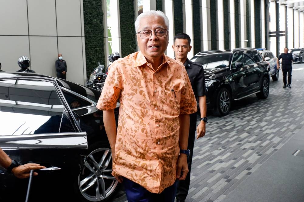 File picture shows then-caretaker prime minister Datuk Seri Ismail Sabri Yaakob arriving at St Regis in Kuala Lumpur on November 23, 2022. — Picture by Firdaus Latif