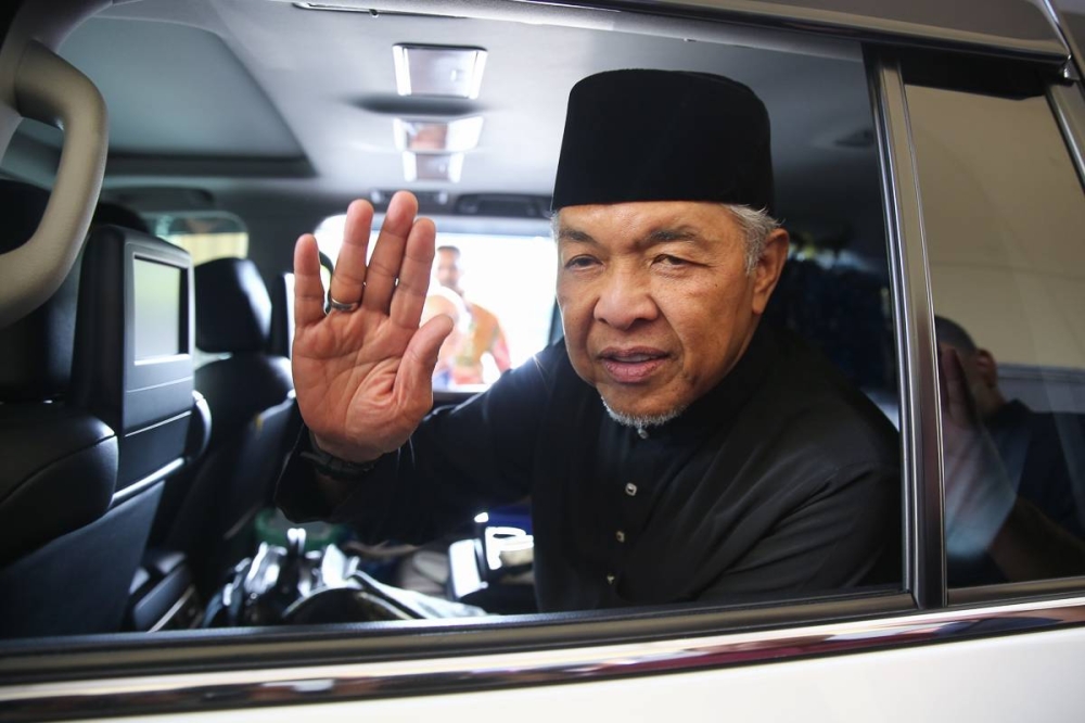 BN chairman Datuk Seri Ahmad Zahid Hamidi reacts as he heads to National Palace in Kuala Lumpur November 24, 2022. — Picture by Yusof Mat Isa